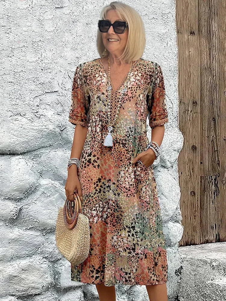 Elara – Elegantní vzorované midi šaty
